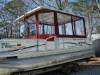 Side view of Capt. Don Lane's Crest Super Fish and custom Hard top and deck lighting.